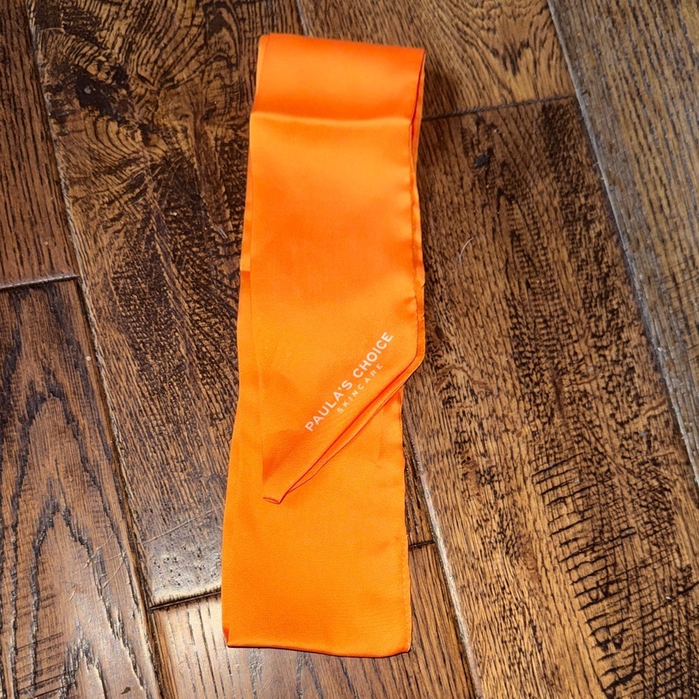 NWOT Paula's Choice Bright Orange Satin Accessory